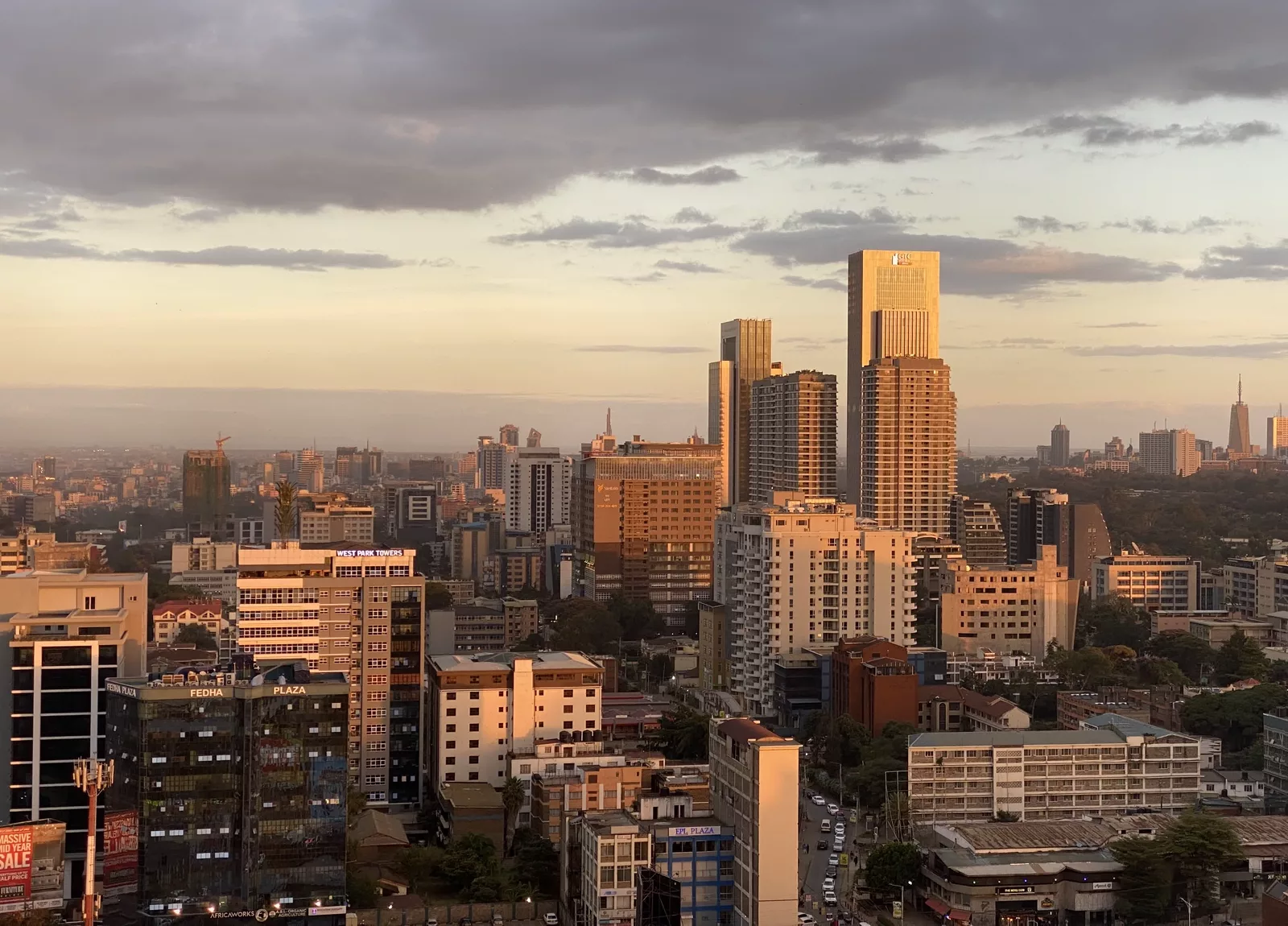 Nairobi at golden hour, light on the towers of the business district